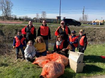 Team members collecting trash 